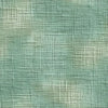 Rouleau de Papier Peint Intissé Vert Sauge Opal déroulé contre un mur, révélant une texture douce et veloutée aux reflets opalescents évoquant la sérénité d'un jardin botanique