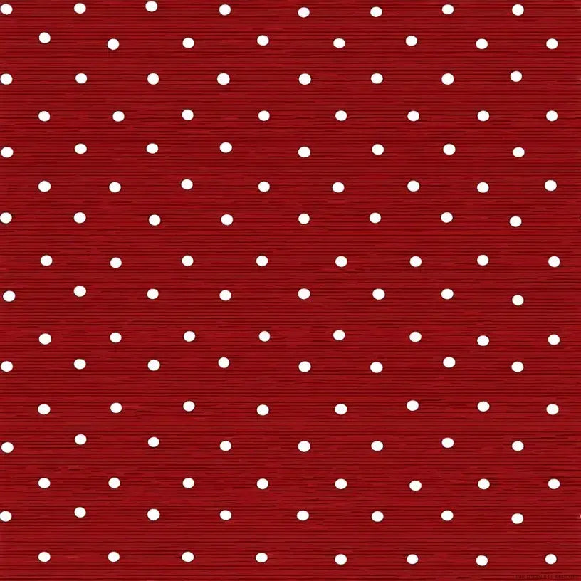 Rouleau de Papier Peint Rouge à Pois Blancs élégant déroulé sur une table en bois, révélant son motif graphique contrasté et moderne