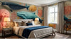 Chambre de bébé décorée avec un Papier Peint Baleine et Animaux Marins Enfant aux couleurs vives représentant un univers sous-marin féerique peuplé de pieuvres, coquillages et bancs de poissons tropicaux
