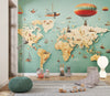 Papier peint Papier peint enfant carte du monde et bateaux volants aux couleurs pastel