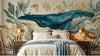Sticker Mural Enfant Baleine et Animaux Marins Aquarelle posé sur un mur blanc de chambre de bébé, créant une atmosphère douce et apaisante avec ses illustrations marines peintes à l'aquarelle