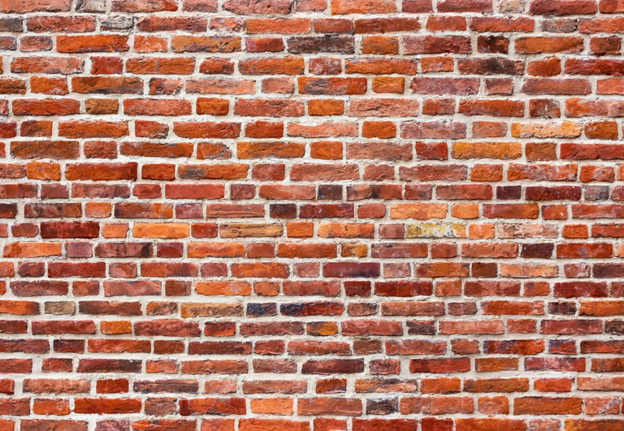 Papier peint effet brique 3D : mur de briques rouges et orangées aux joints clairs