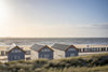 Papier peint panoramique maison vue bord de plage
