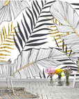 Gold and black tropical leaves wallpaper
