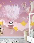 Child's wallpaper with pink starry sky and hot air balloons