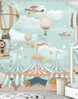 Child's wallpaper with circus tents, hot air balloons, and planes