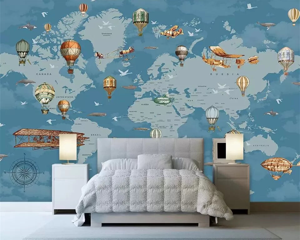 Child&#39;s world map with airplanes and hot air balloons wallpaper