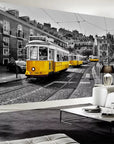 Yellow tramway on a black and white street wallpaper
