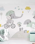 Child's little elephant on a bicycle wallpaper