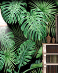 Dark green tropical leaves wallpaper