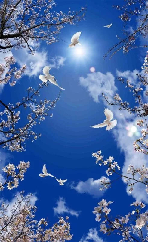 Blue sky and cherry blossom branches wallpaper